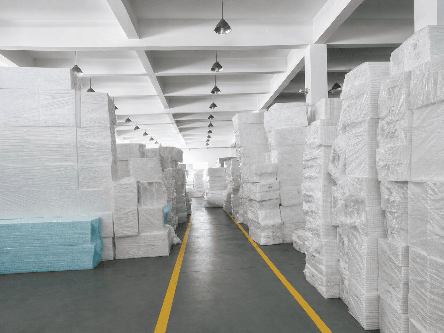 Organized foam material storage aisle inside the Yiruida factory