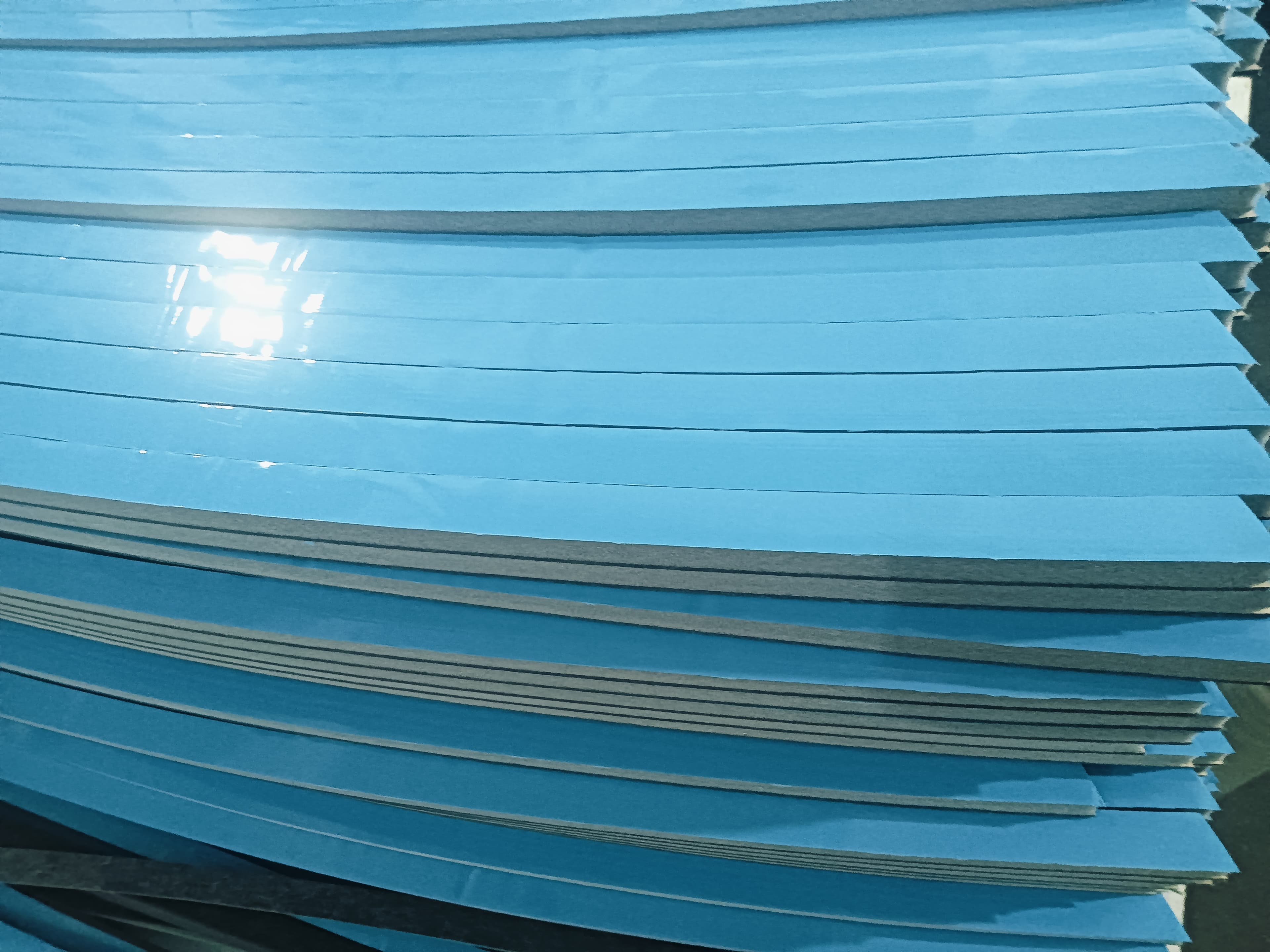 Layered blue foam packaging components